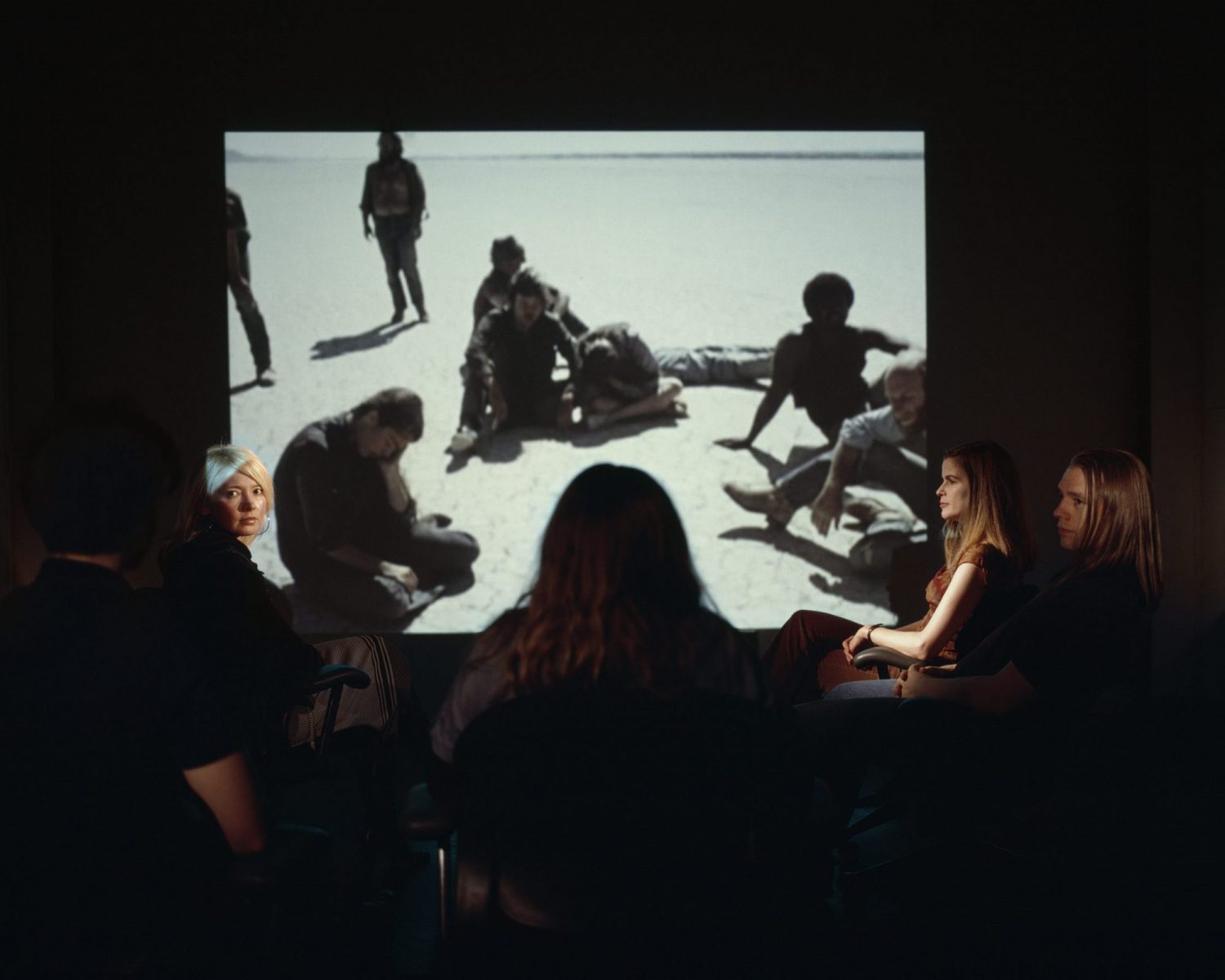 Group of People Watching a Screening of Peter Watkin's Punishment Park
